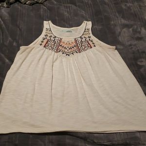 Tank top with embroidered neckline.
